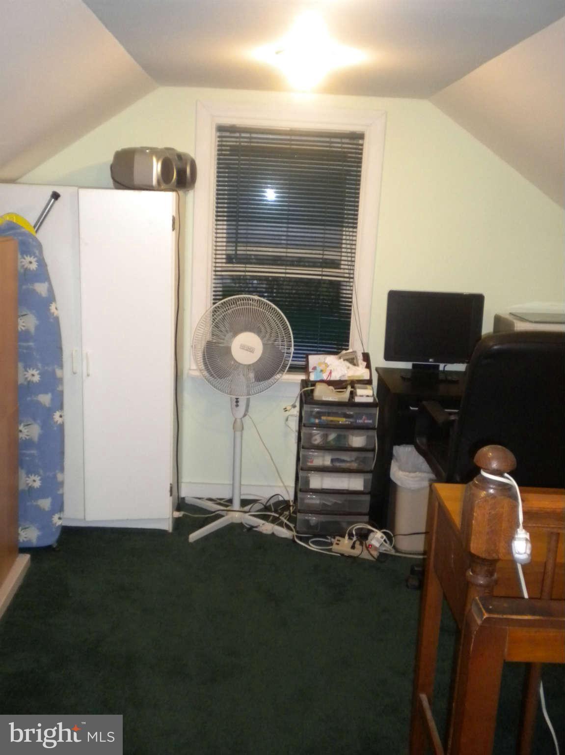 7614 Spruce Road Baltimore, MD 21222 - Photo 28 of 30 a view of workspace with washer and dryer