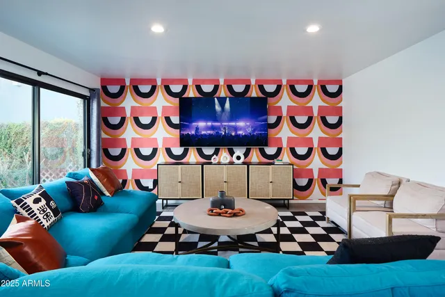 a bathroom with a mirror and a sink