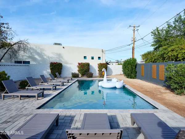 a view of a living room and kitchen