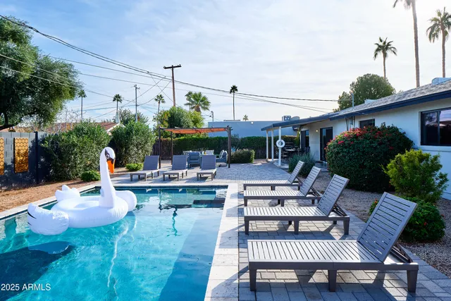 a view of a patio with couches table and chairs