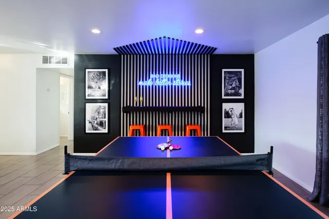 a view of a room with furniture and window