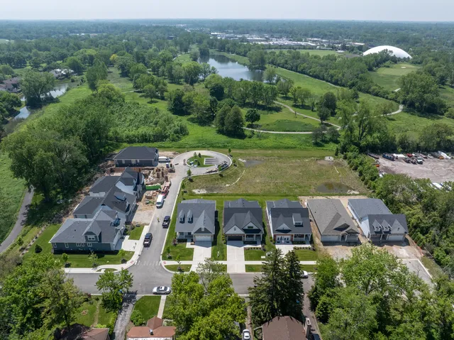 an aerial view of a house with outdoor space