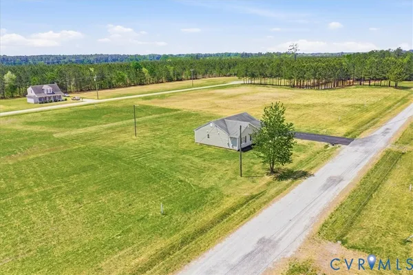 a view of a lake with a big yard
