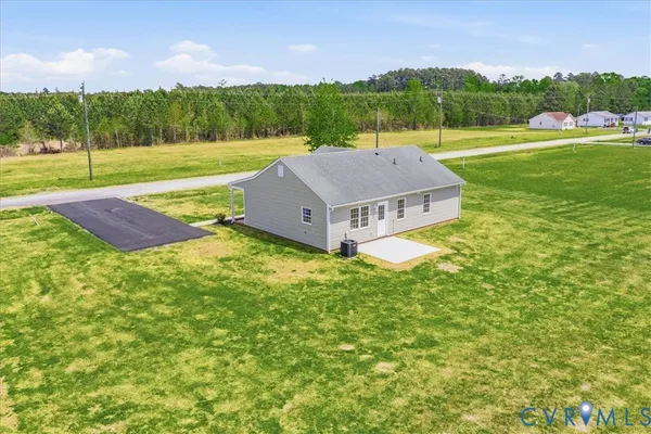 a view of a house with a big yard