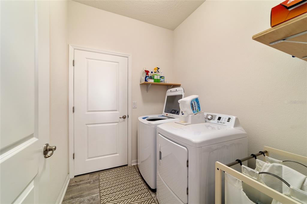 9238 Southwest 60th Terrace Road Ocala, FL 34476 - Photo 42 of 50 a utility room with dryer and washer