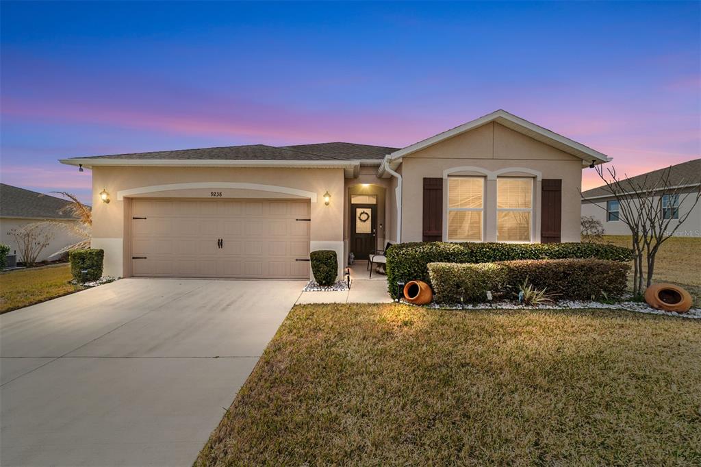 9238 Southwest 60th Terrace Road Ocala, FL 34476 - Photo 8 of 50 a view of a house with a yard