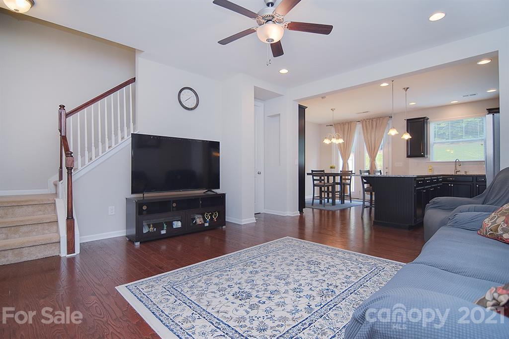 1411 Calum Way Fort Mill, SC 29708 - Photo 3 of 37 a living room with furniture and a flat screen tv