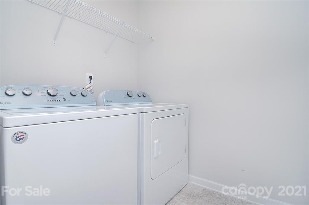 1411 Calum Way Fort Mill, SC 29708 - Photo 26 of 37 a utility room with dryer and washer