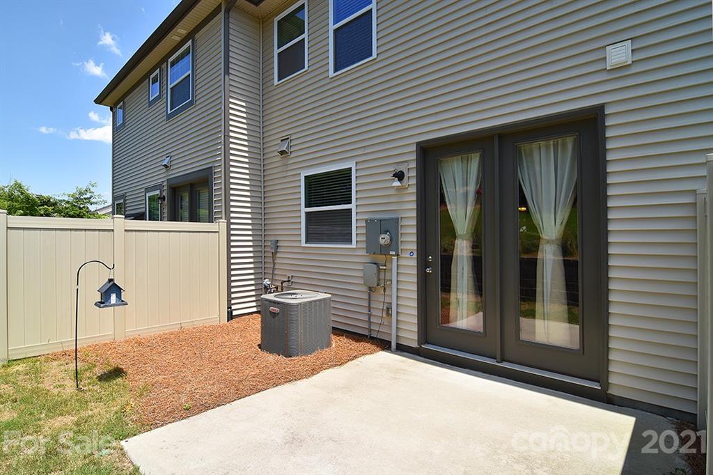 1411 Calum Way Fort Mill, SC 29708 - Photo 28 of 37 a backyard of a house with seating space