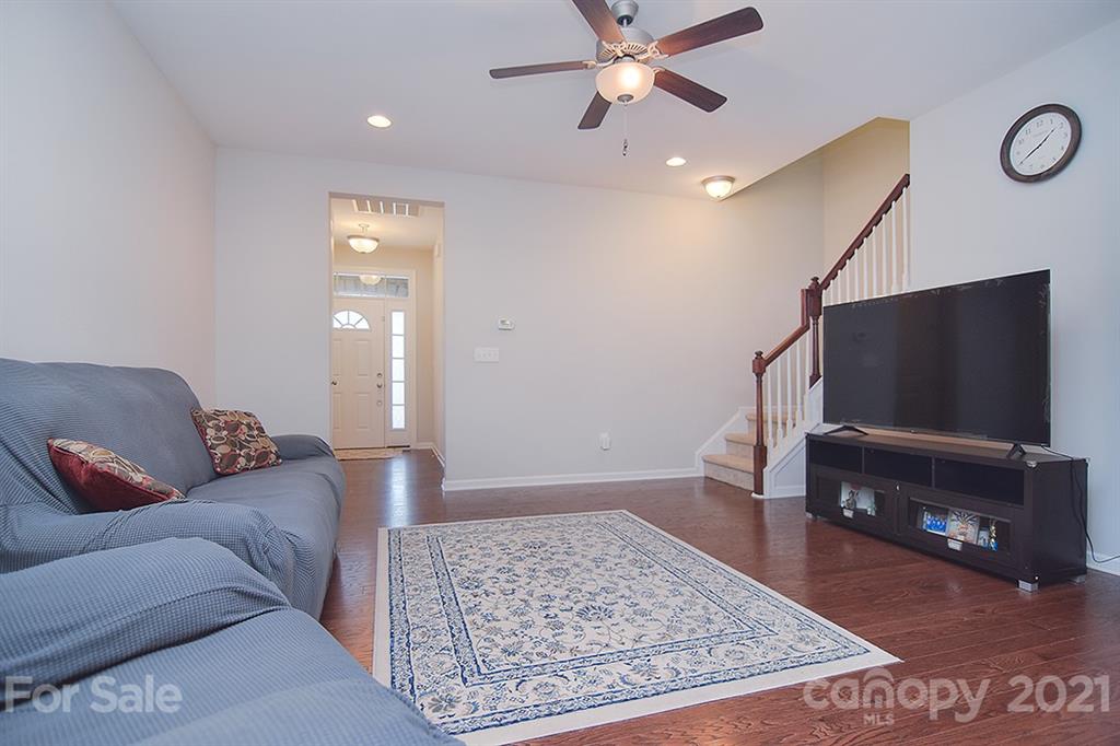 1411 Calum Way Fort Mill, SC 29708 - Photo 5 of 37 a living room with furniture and a flat screen tv