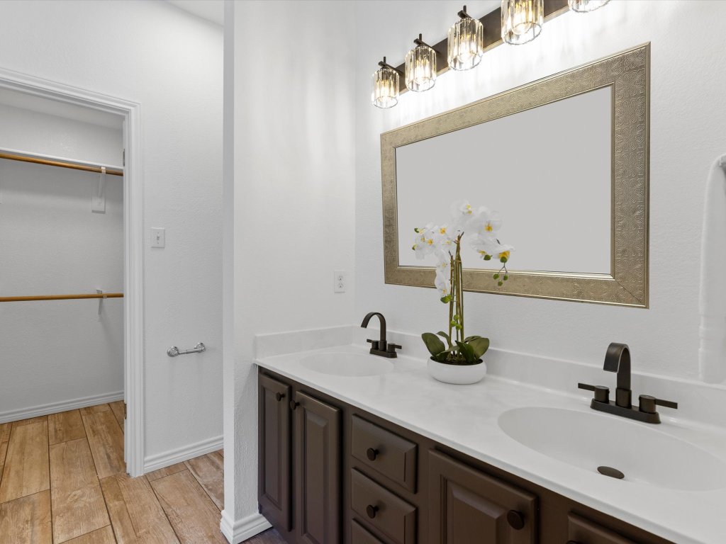 9322 Lightwood Loop Austin, TX 78748 - Photo 23 of 40 There's also a private toilet and an XL walk-in closet.