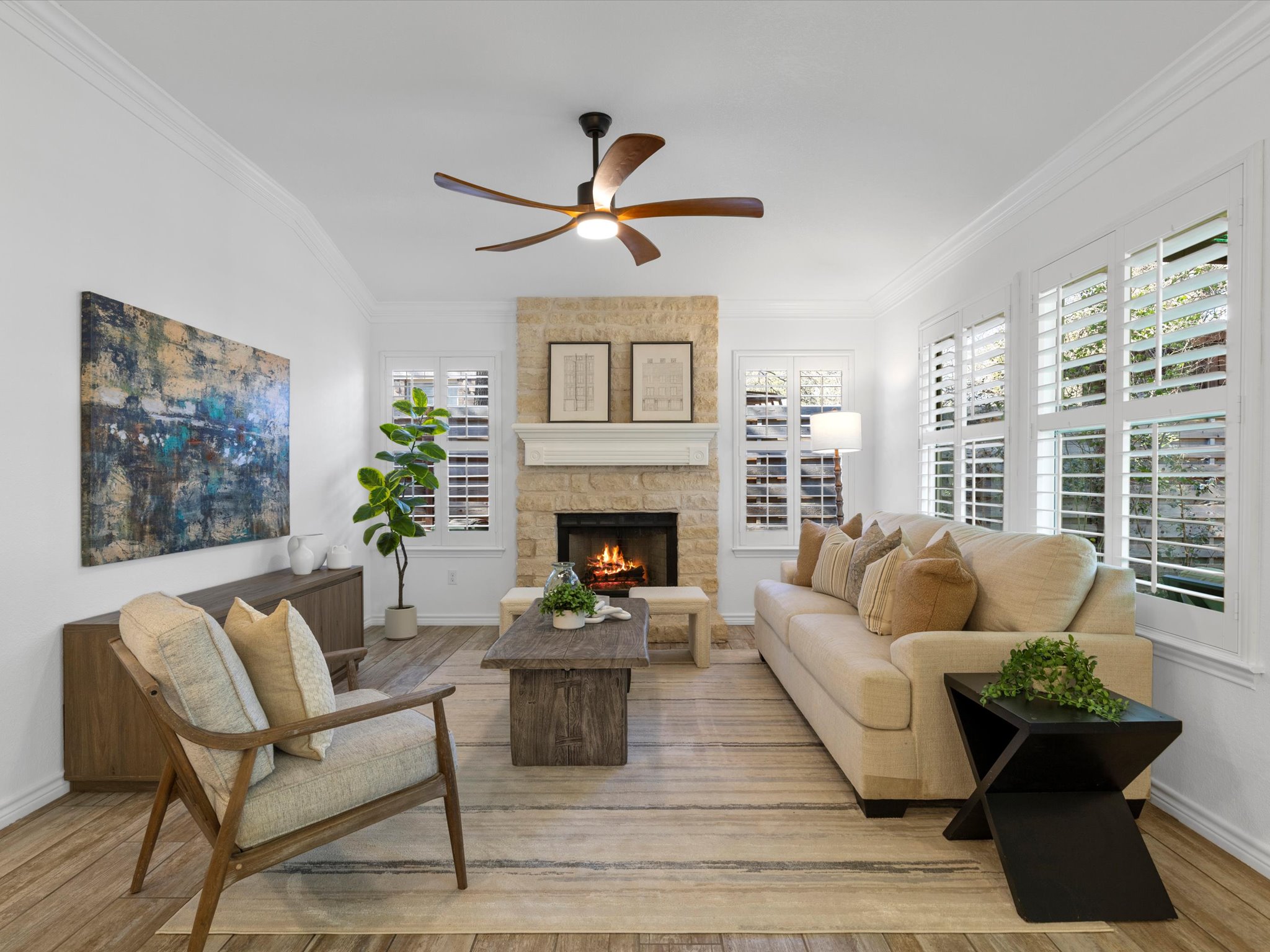 9322 Lightwood Loop Austin, TX 78748 - Photo 4 of 40 The family room is warm and inviting with excellent natural light from windows that also frame peaceful wooded views.