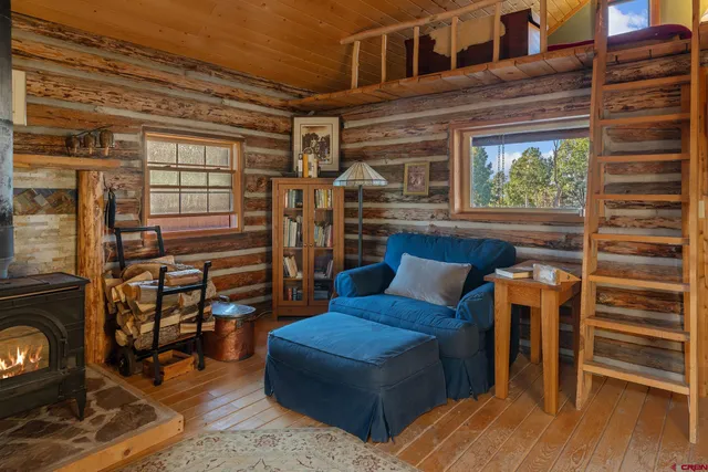 a living room with a couch and a window