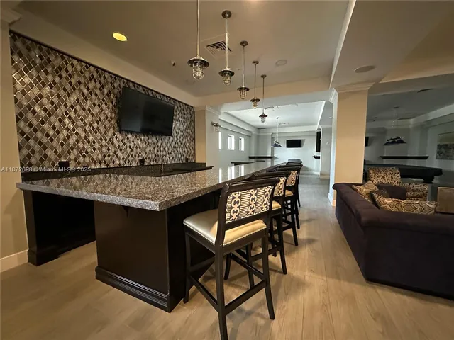 a view of workspace with a couch