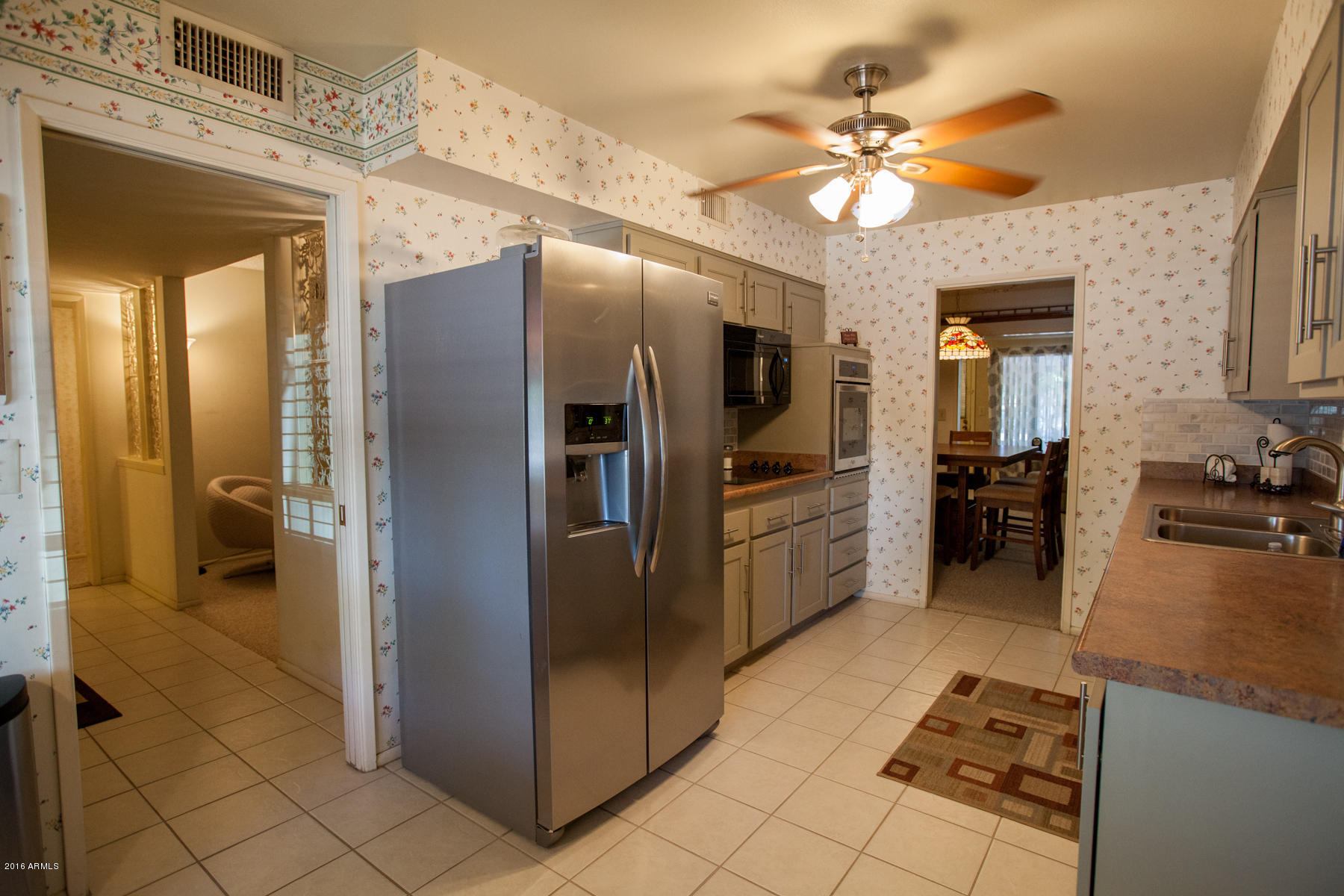 15233 North Ridgeview Road Sun City, AZ 85351 - Photo 7 of 30 kitchen to entry