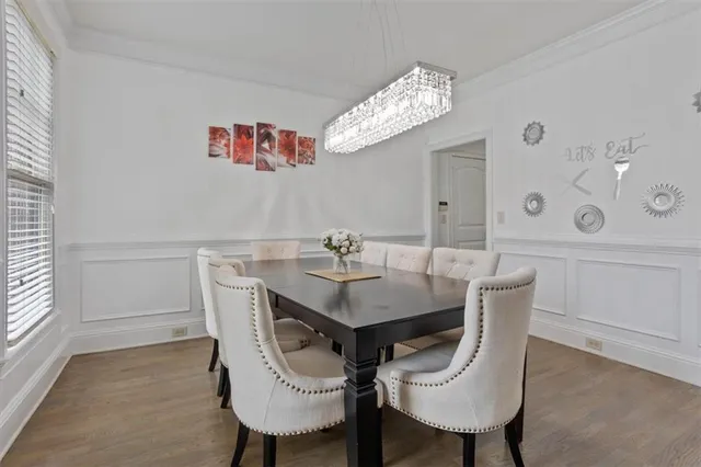 a kitchen with stainless steel appliances a refrigerator sink and microwave