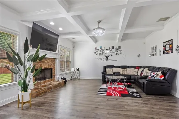 a dining room with furniture and a fireplace