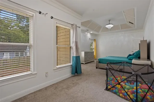 a white toilet sitting next to a window