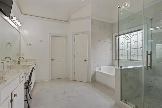 a view of a livingroom with workspace and a window