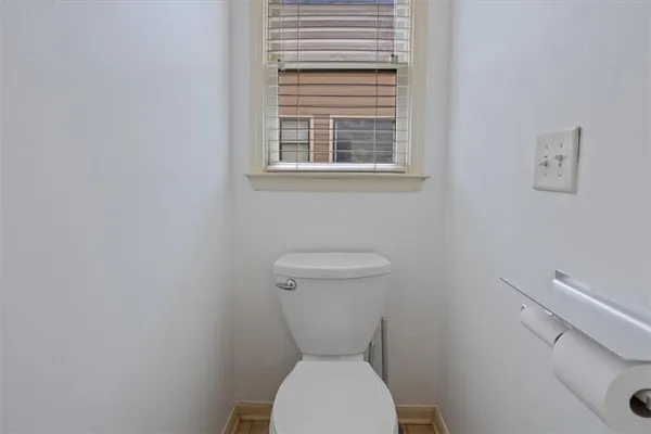 an aerial view of a house with outdoor space