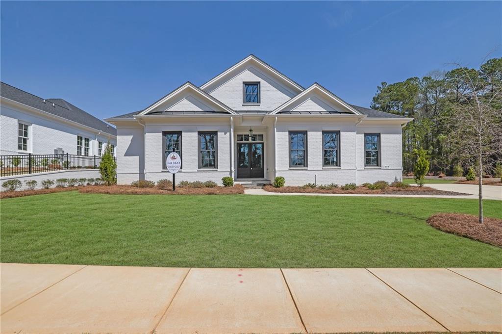 123 Candler Loop Acworth, GA 30101 - Photo 1 of 34 a front view of a house with a yard