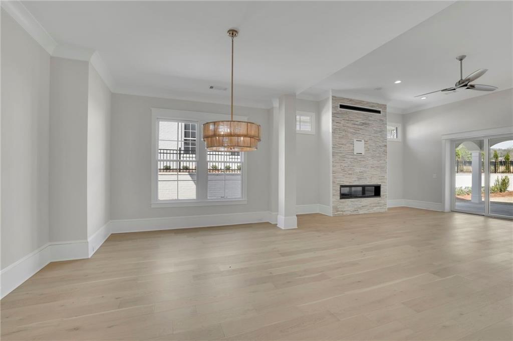 123 Candler Loop Acworth, GA 30101 - Photo 11 of 34 a view of an empty room with window and cabinet
