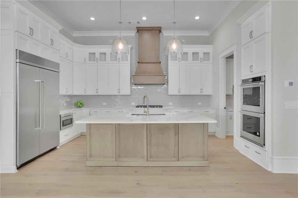 123 Candler Loop Acworth, GA 30101 - Photo 13 of 34 a view of kitchen with granite countertop cabinets and refrigerator