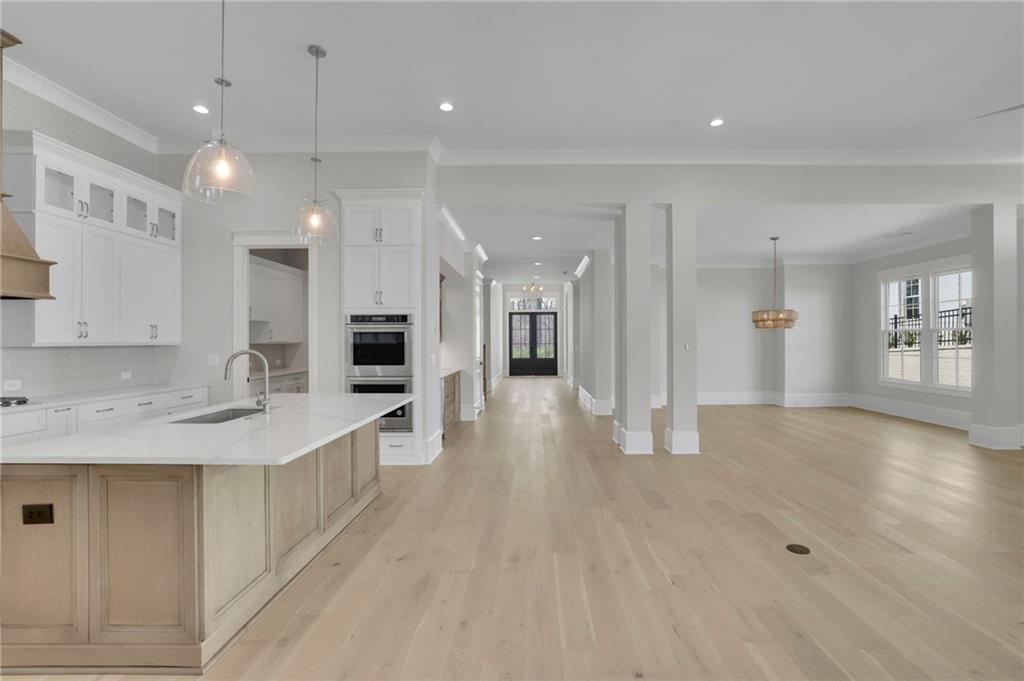 123 Candler Loop Acworth, GA 30101 - Photo 24 of 34 a view of a kitchen with a sink and a refrigerator