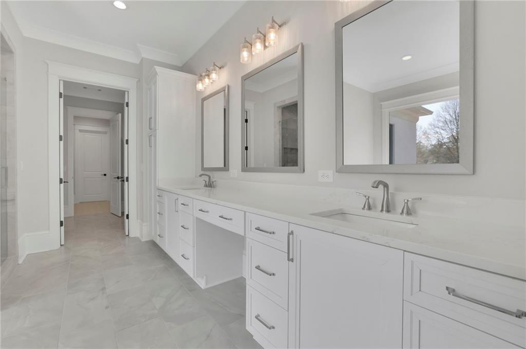 123 Candler Loop Acworth, GA 30101 - Photo 27 of 34 a bathroom with a double vanity sink mirror and