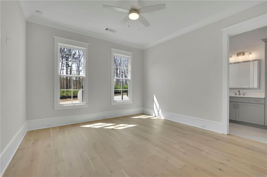 123 Candler Loop Acworth, GA 30101 - Photo 34 of 34 wooden floor in an empty room with a window