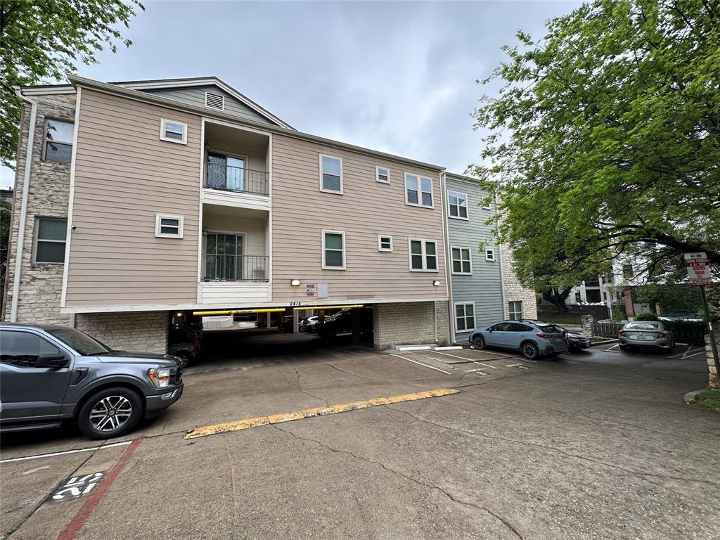 2414 Longview Street, Unit 301 Austin, TX 78705 - Photo 15 of 15 a view of a car parked in front of a house