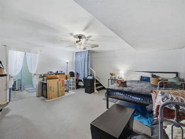 a work room with furniture and windows