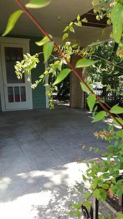 a vase of flowers sitting on a floor