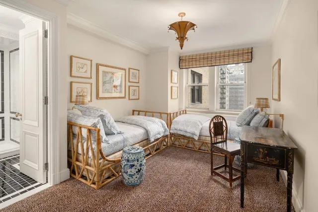 a bath room with a sink a toilet and bath tub