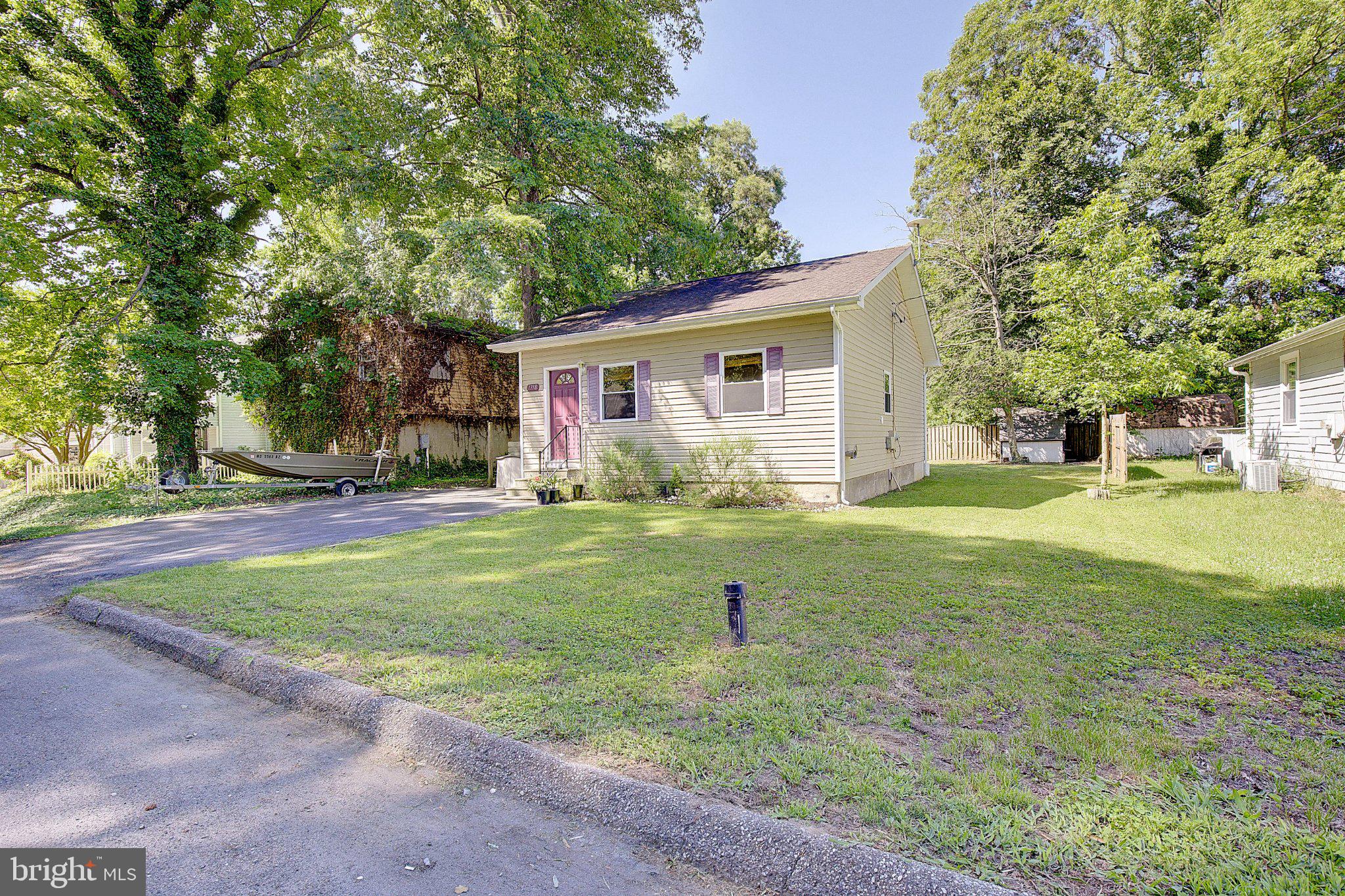 1718 Ridgely Road Edgewater, MD 21037 - Photo 2 of 19 Charming home nestled in lush greenery.