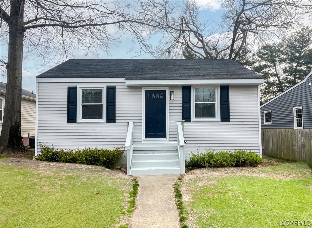 5413 Blue Ridge Avenue Richmond, VA 23231 - Photo 1 of 1 a front view of a house with garden
