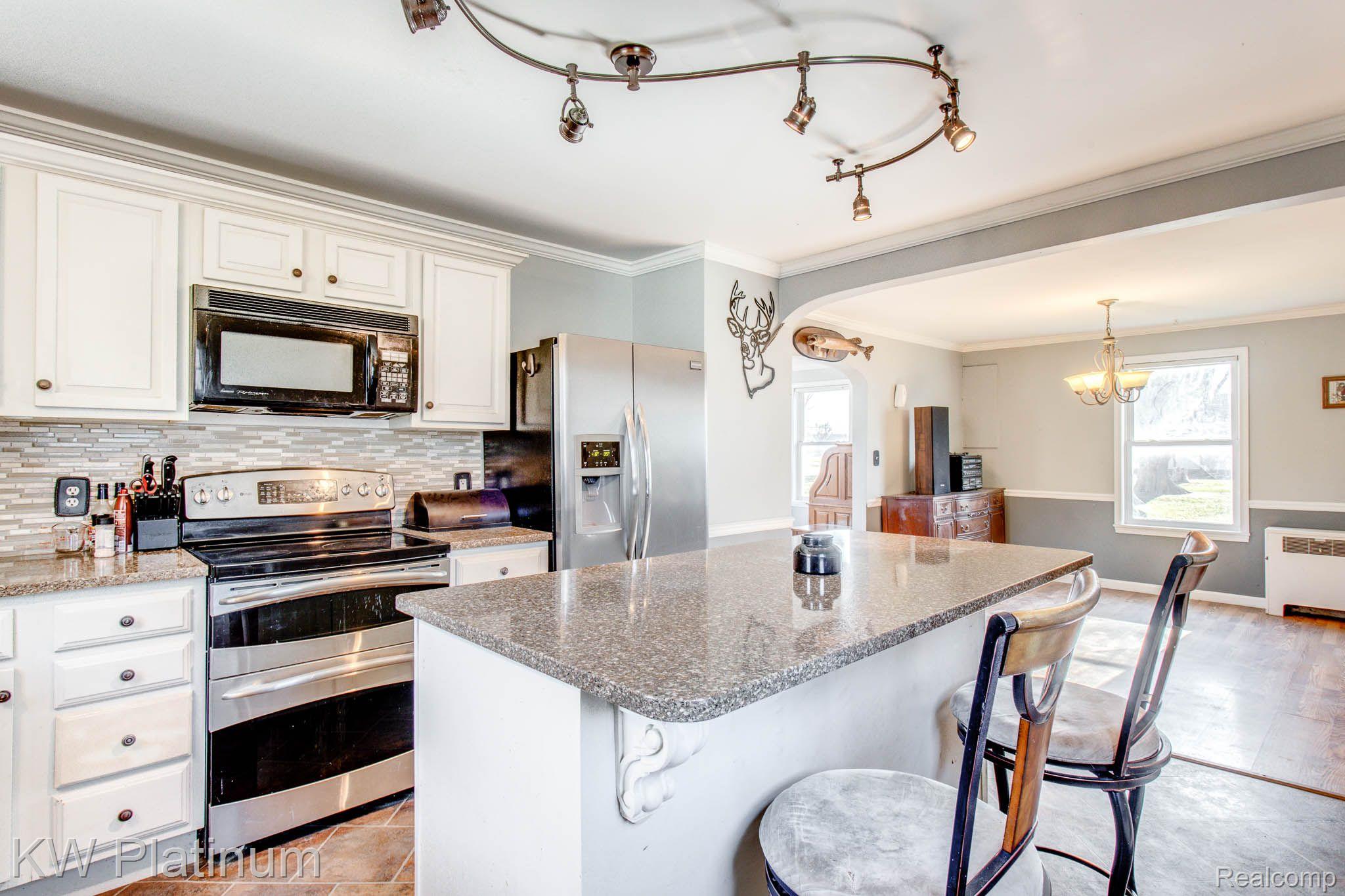 6795 Fargo Road Avoca, MI 48006 - Photo 11 of 31 Kitchen to DR.