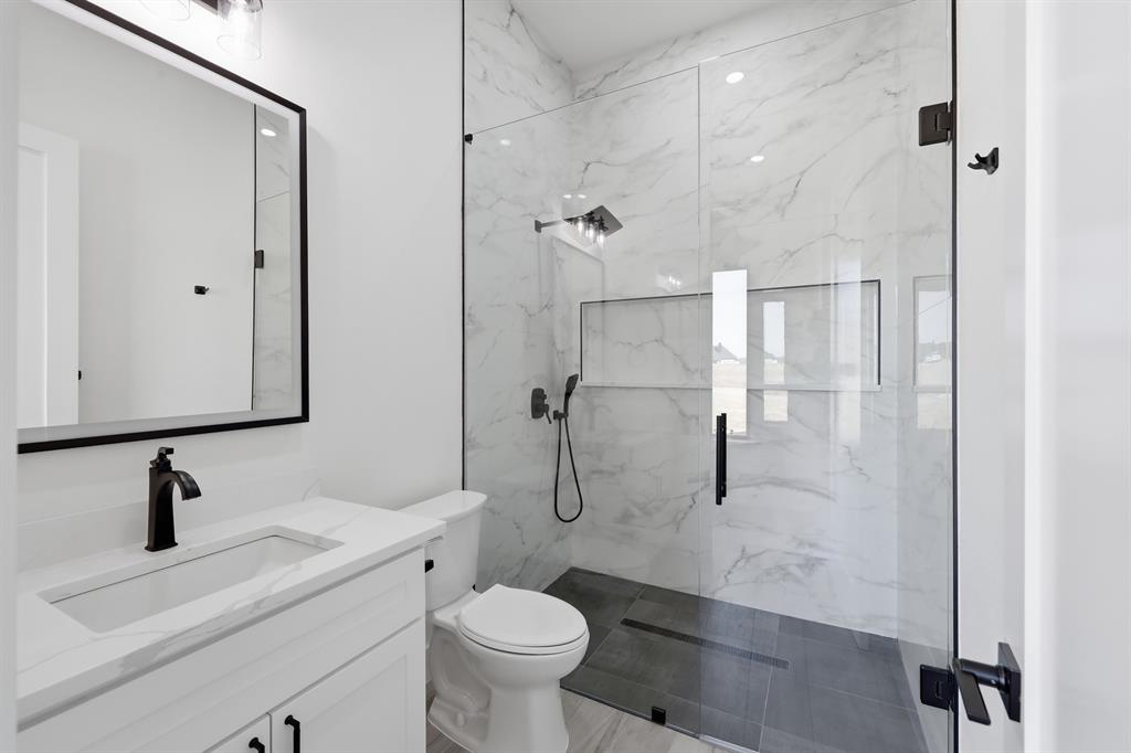 150 Briar Patch Azle, TX 76020 - Photo 14 of 40 a bathroom with a sink toilet and shower