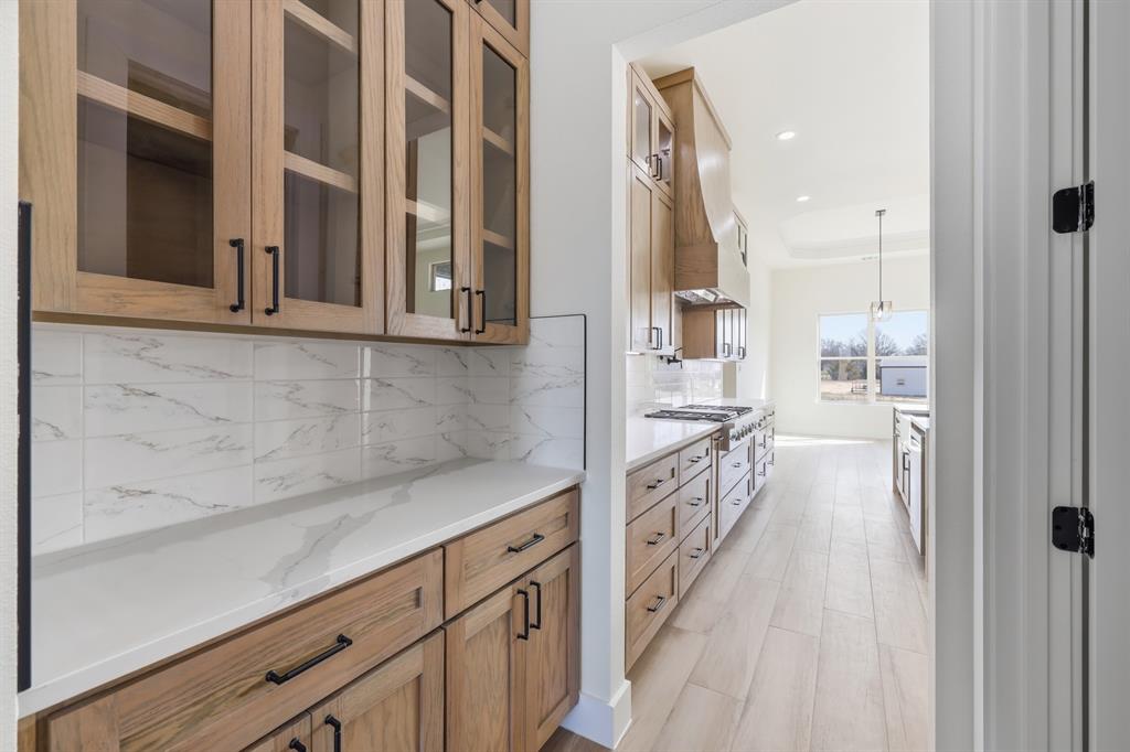 150 Briar Patch Azle, TX 76020 - Photo 8 of 40 Butler party leading to dining room.