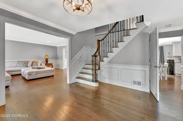 a view of livingroom with furniture and wooden floor