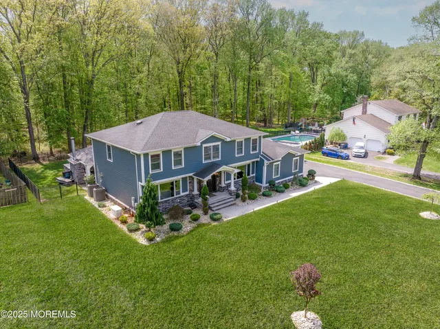 a view of a house with a big yard