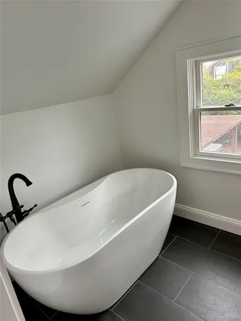 a bathroom with a bathtub