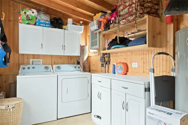 a utility room with dryer and washer