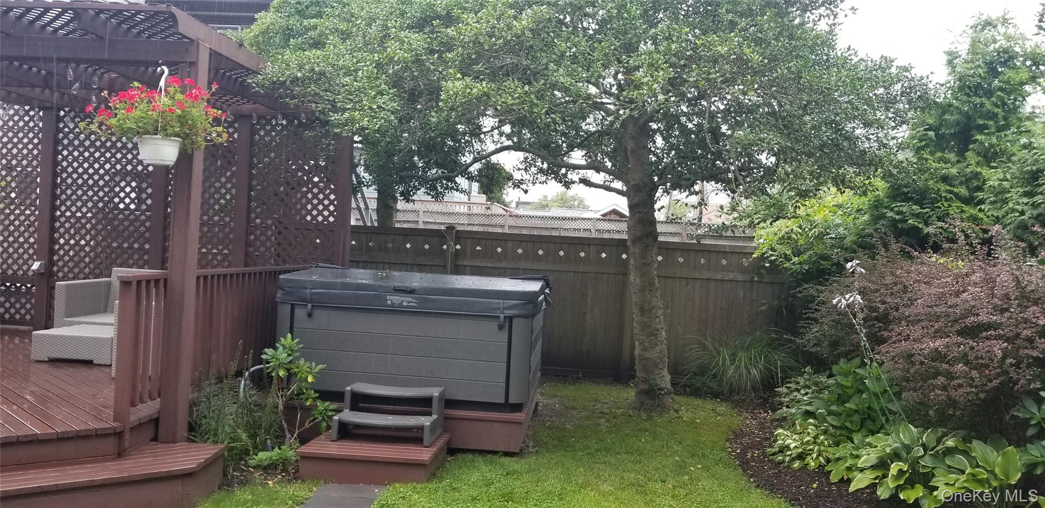 19 Ocean Road Ocean Beach, NY 11770 - Photo 19 of 20 a view of a garden with statue