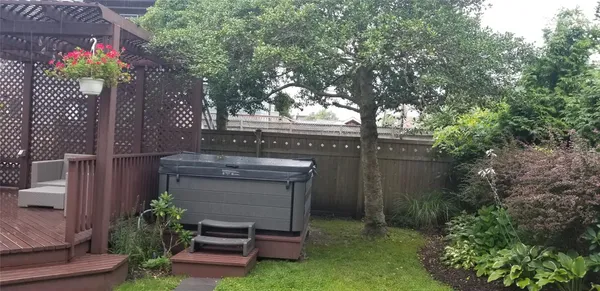 a view of a garden with statue
