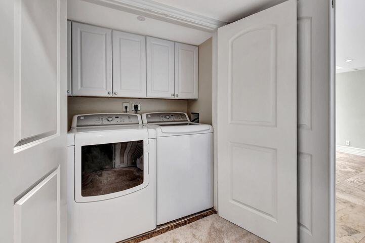 1 Harbourside Drive, Unit 4102 Delray Beach, FL 33483 - Photo 10 of 10 a utility room with dryer and washer