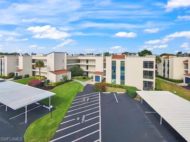 a view of a swimming pool with a lounge chairs