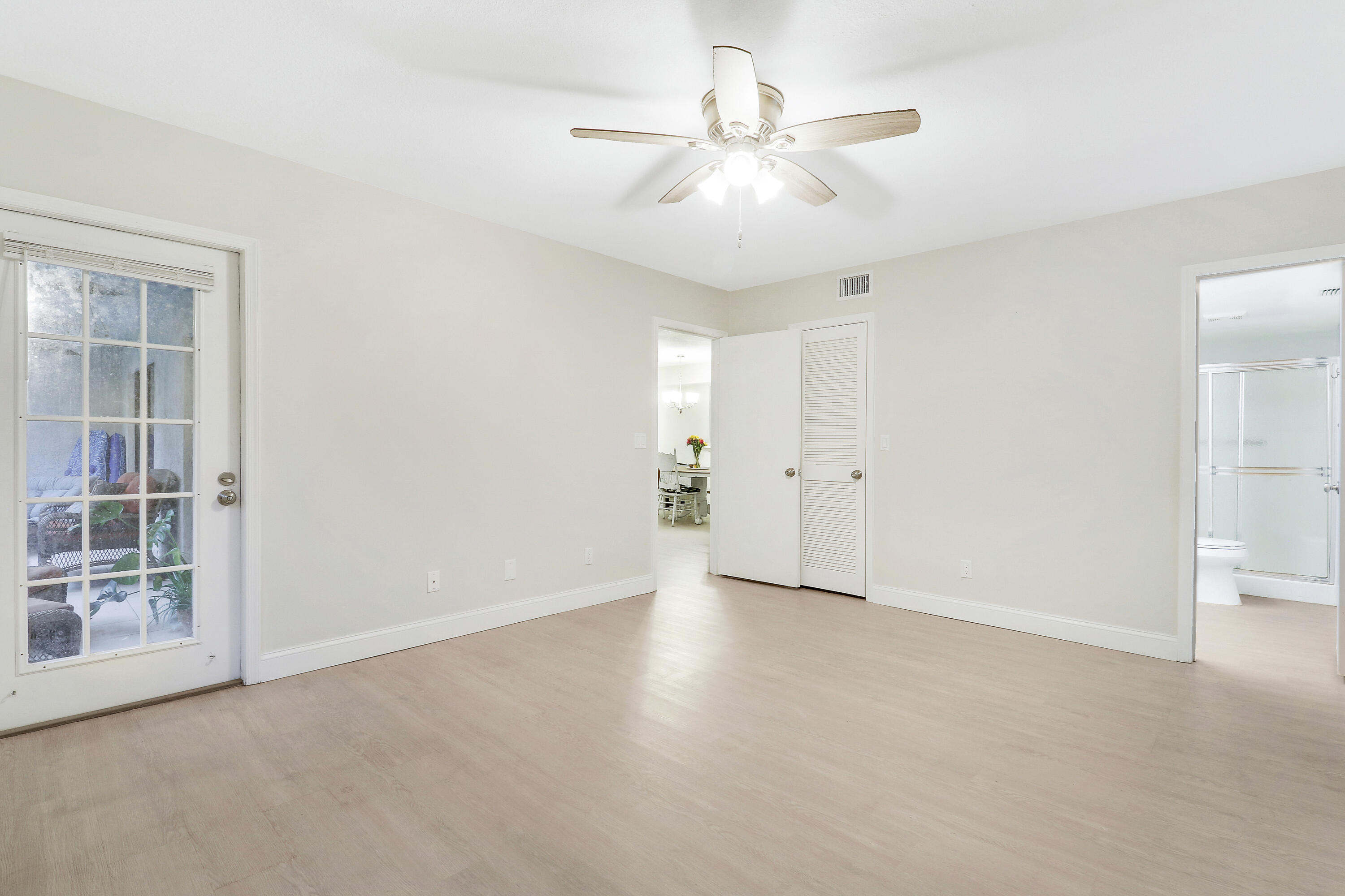 1200 Southeast Parkview Place, Unit F3 Stuart, FL 34994 - Photo 22 of 32 a view of an empty room with a window