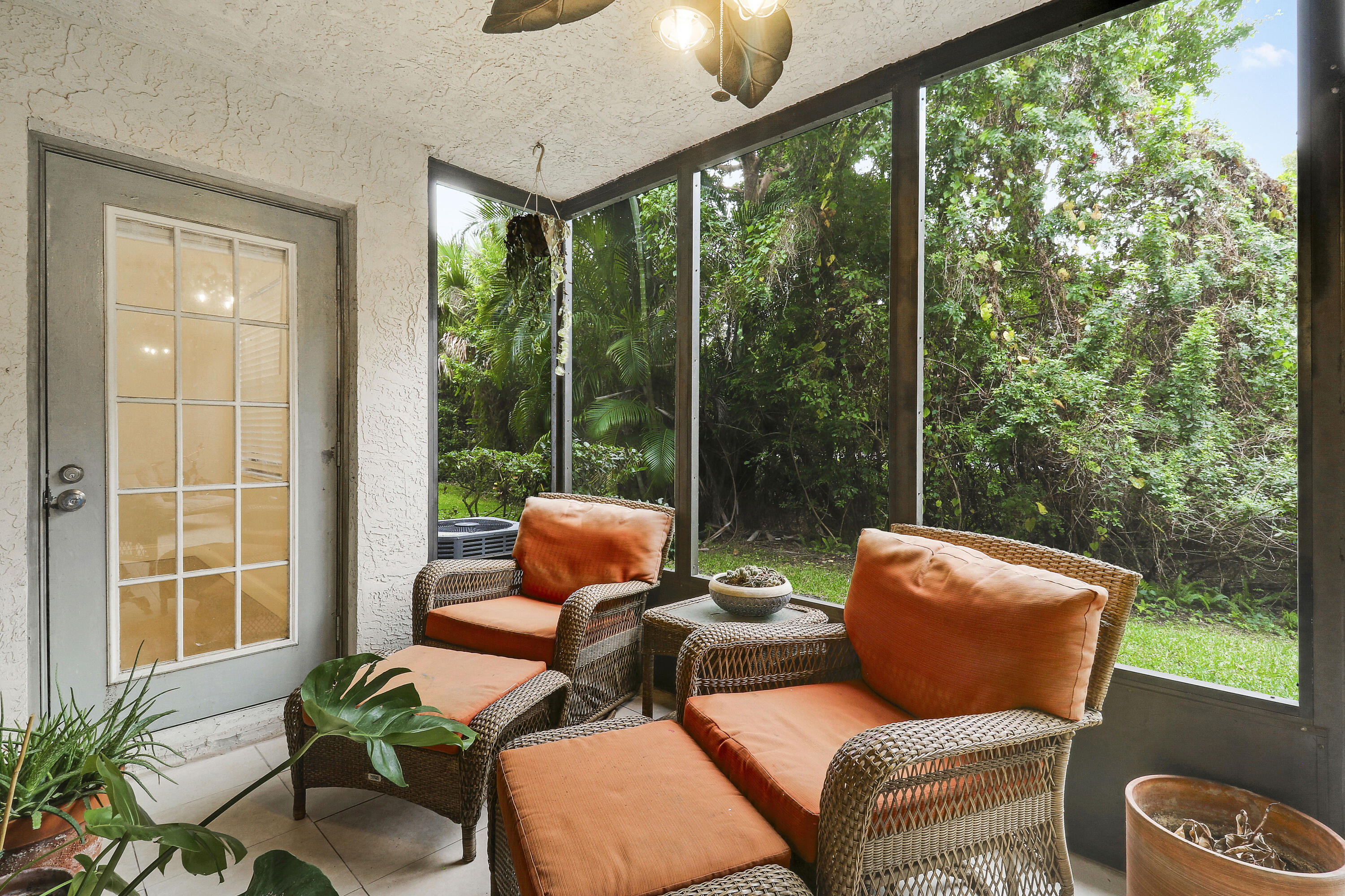 1200 Southeast Parkview Place, Unit F3 Stuart, FL 34994 - Photo 29 of 32 a outdoor living space with furniture and garden view