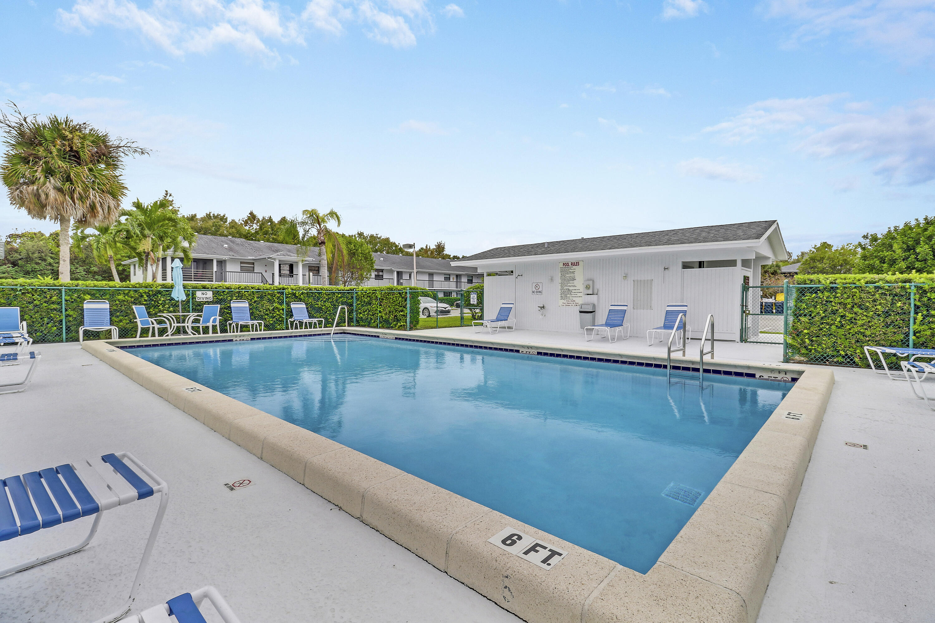 1200 Southeast Parkview Place, Unit F3 Stuart, FL 34994 - Photo 32 of 32 a view of a swimming pool with a terrace